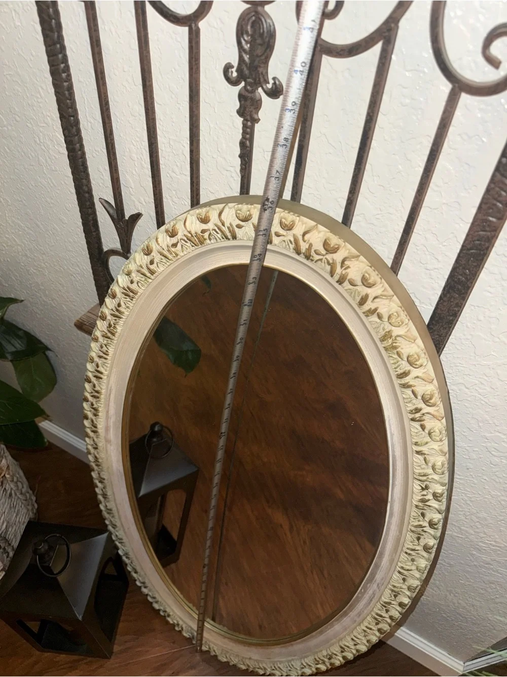 Vintage Oval Wall Mirror Featuring An Ornate, Off-White And Gold-Accented Frame